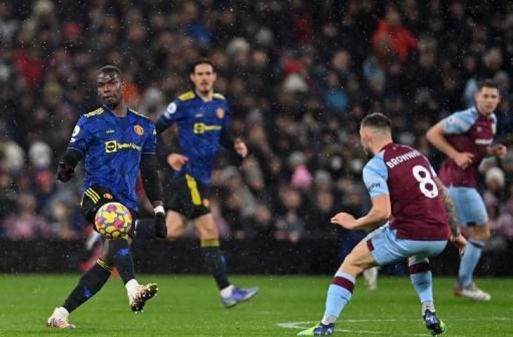 Aksi Paul Pogba saat Manchester United ditahan imbang Burnley 1-1 di ajang Liga Inggris. (PAUL ELLIS / AFP)