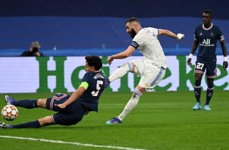 Karim Benzema cetak hattrick saat Real Madrid kalahkan PSG 3-1. (GABRIEL BOUYS / AFP)