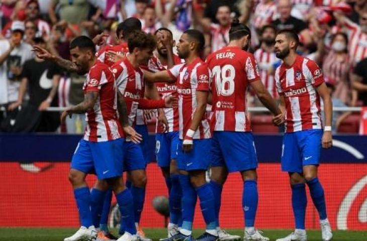 Pemain Atletico Madrid merayakan gol kemenangan atas Espanyol yang dicetak Yannick Carrasco. (AFP)