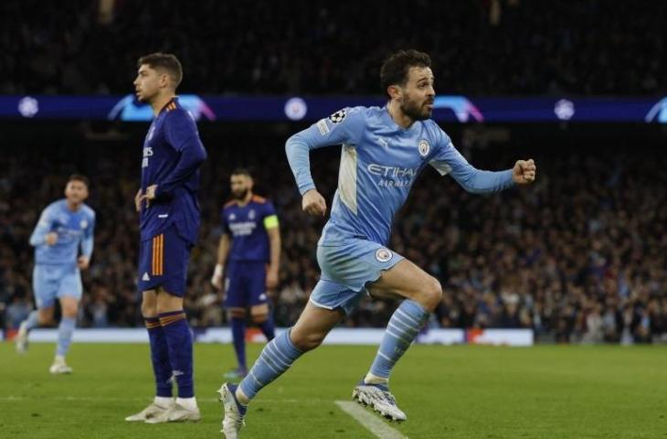 Selebrasi Bernardo Silva setelah mencetak gol keempat Manchester City dalam pertandingan leg pertama semifinal Liga Champions lawan Real Madrid pada 27 April 2022 WIB. ANTARA/Reuters/JASON CAIRNDUFF