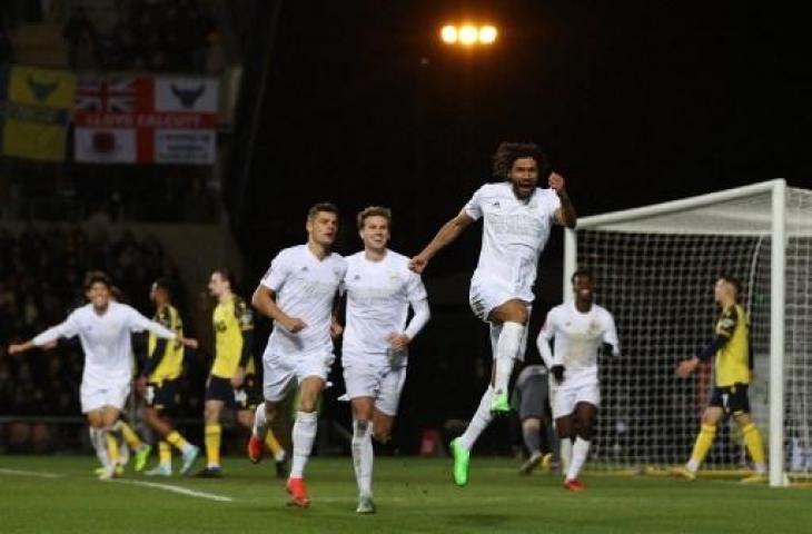 Selebrasi Mohamed Elneny usai cerak gol saat Arsenal tundukkan Oxford United 3-0 di Piala FA. (AFP)