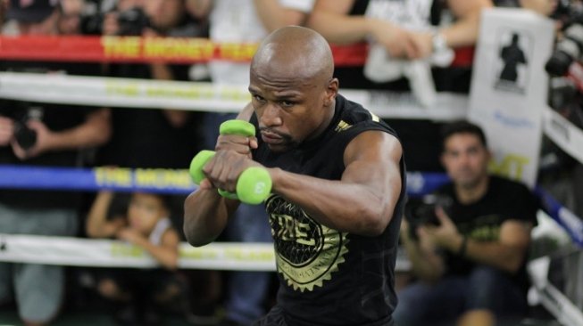 Legenda tinju dunia, Floyd Mayweather Jr. [AFP/John Gurzinksi]