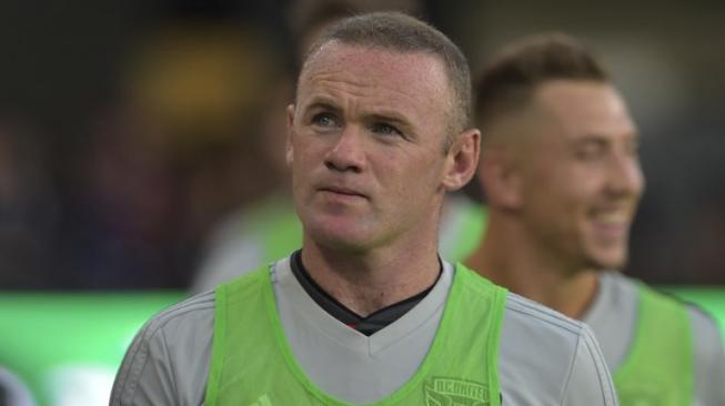 Penyerang DC United, Wayne Rooney. [ANDREW CABALLERO-REYNOLDS / AFP]