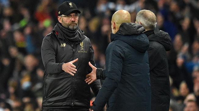 Ekspresi pelatih Liverpool, Jurgen Klopp usai timnya dikalahkan oleh Manchester City di Etihad Stadium, Manchester Inggris, Jumat (4/1). [Oli SCARFF / AFP]