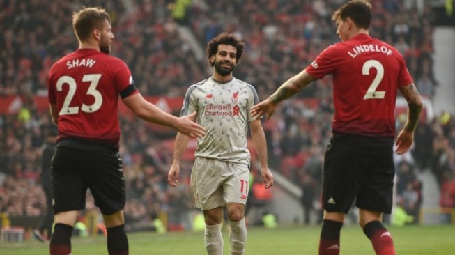 Suasana laga pekan ke-27 Liga Inggris 2018/2019 antara Manchester United vs Liverpool di Old Trafford, Minggu (24/2/2019) malam WIB. [Oli SCARFF / AFP]