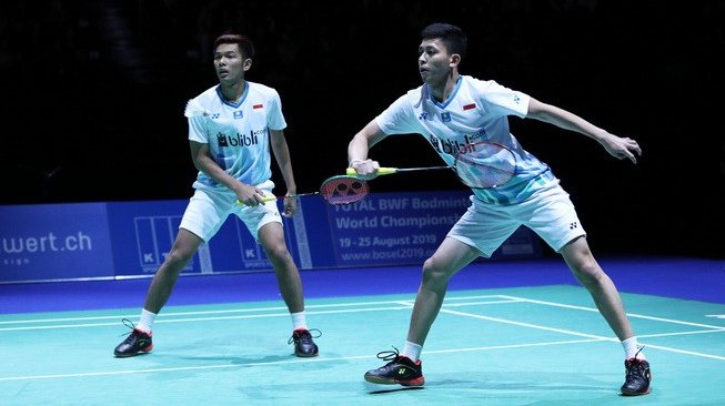 Pasangan ganda putra Indonesia, Fajar Alfian/Muhammad Rian Ardianto, menjuarai Swiss Open 2019 usai mengalahkan wakil China Taipei, Lee Yang/Wang Chi-Lin, Minggu (17/3/2019). [Humas PBSI]