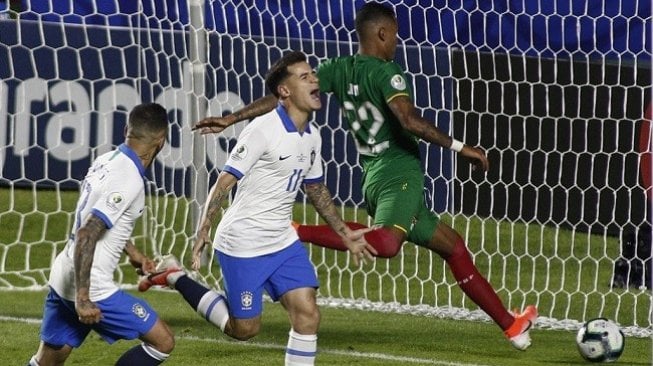 Ekspresi gelandang serang Brasil Philipe Coutinho usai membobol gawang Bolivia di laga perdana Copa America 2019, Sabtu (15/6/2019) pagi WIB. (AFP)