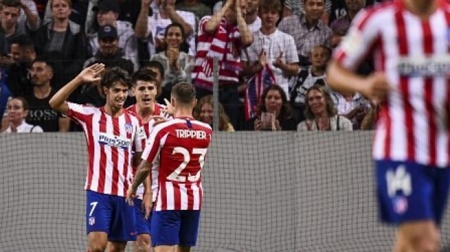 Pemain Atletico Madrid Joao Felix (tengah) merayakan golnya ke gawang Juventus di Solna, Stockholm, Sweden. Jonathan NACKSTRAND / AFP