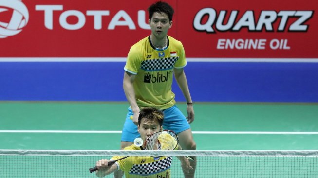 Pasangan ganda putra Indonesia, Kevin Sanjaya Sukamuljo/Marcus Fernaldi Gideon yang dijuluki The Minions, tersingkir dari Kejuaraan Dunia Bulutangkis 2019 usai kalah dari Choi Solgyu/Seo Seung Jae (Korsel) di babak kedua, Rabu (21/8). [Humas PBSI]