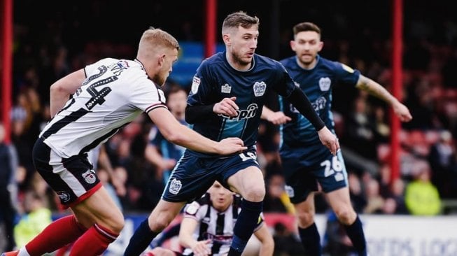 Pemain Bury FC saat berlaga di League One beberapa waktu lalu. (Instagram/@buryfcofficial)