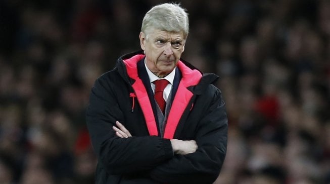 Mantan pelatih Arsenal, Arsene Wenger. [Ian KINGTON / IKIMAGES / AFP]