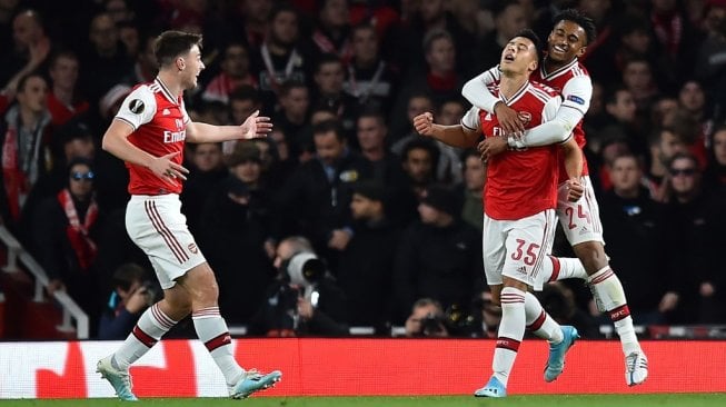 Pemain Arsenal merayakan gol Gabriel Martinelli ke gawang Standard Liege pada lanjutan Liga Europa 2019/20 di Stadion Emirates, Jumat (4/10/2019). (Glyn KIRK / AFP)