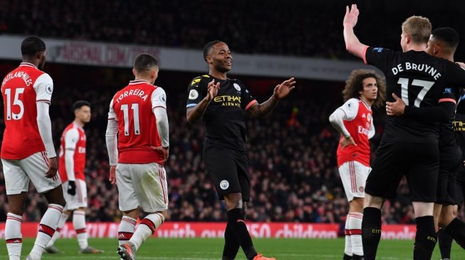 Manchester City sukses mengalahkan Arsenal di kandangnya 3-0 tanpa balas di laga lanjutan Liga Inggris di Emirates Stadium, Senin (16/12/2019) dini hari WIB. (Foto: AFP / Ben STANSALL)