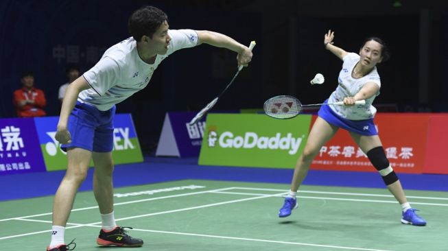 Pasangan ganda campuran Korsel, Chae Yujung (kanan) dan Seo Seung-jae. [AFP/Wang Zhao]