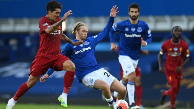 Suasana laga Liga Inggris 2019/2020 antara Everton vs Liverpool di Goodison Park, Liverpool, Senin (22/6/2020) dini hari WIB. [Shaun Botterill / POOL / AFP]