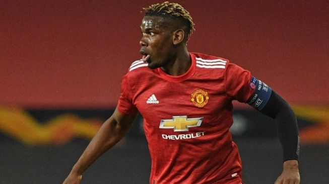 Gelandang sentral Manchester United, Paul Pogba. [OLI SCARFF / AFP]