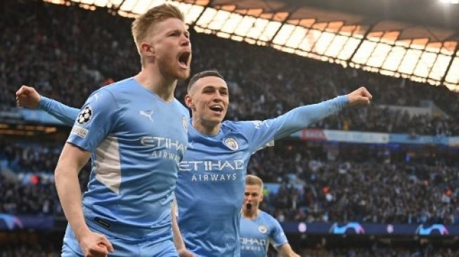 Gelandang Manchester City Kevin De Bruyne melakukan selebrasi setelah mencetak gol pada pertandingan leg pertama semifinal Liga Champions UEFA antara Manchester City dan Real Madrid, di Stadion Etihad, di Manchester, pada 26 April 2022. Paul ELLIS/AFP